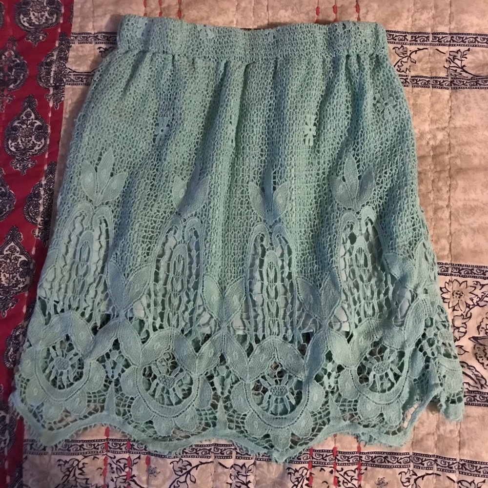 Turquoise fitted lace skirt